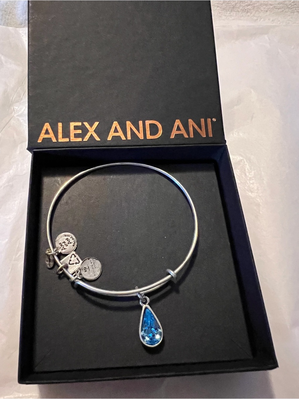 Alex and Ani Silver Bangle with Blue Topaz Teardrop Charm